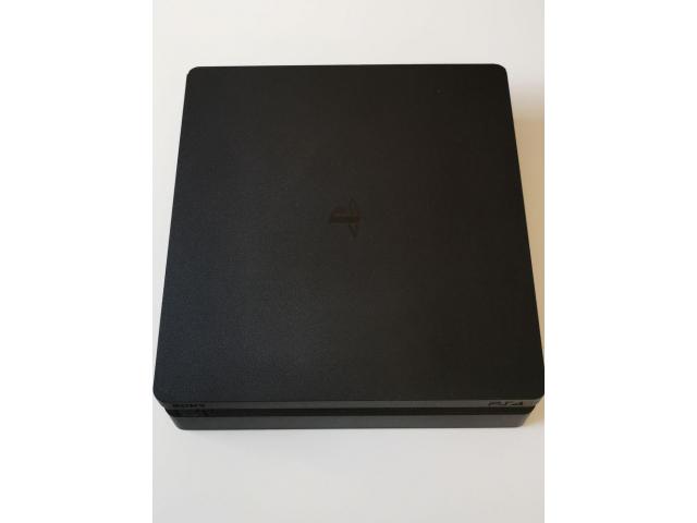 PS4 slim 500g noir + casque audio USB